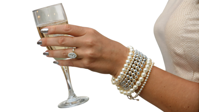 A woman in a white ensemble holds a tall champagne flute with effervescent bubbles, embodying minimalistic style and refinement, isolated on a transparent background, PNG