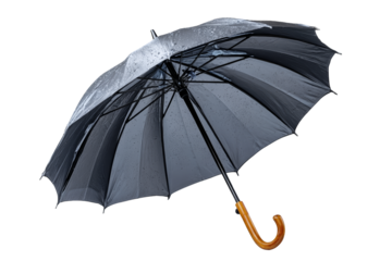 Rainy day protection black umbrella urban street product photography wet environment close-up view weather preparedness