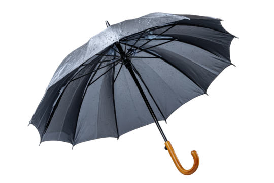 Rainy day protection black umbrella urban street product photography wet environment close-up view weather preparedness