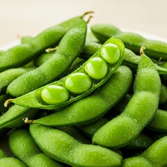 Close-up of Fresh Green Edamame Pods with One Open, Revealing Beans
