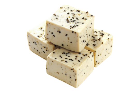 Cubes of seasoned tofu with visible herbs and spices, arranged in stack isolated on white transparent background, concept of healthy vegetarian protein option
