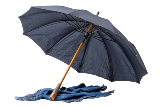 Rainy day necessities umbrella on a cozy blanket indoor setting still life warm atmosphere capturing comfort serenity