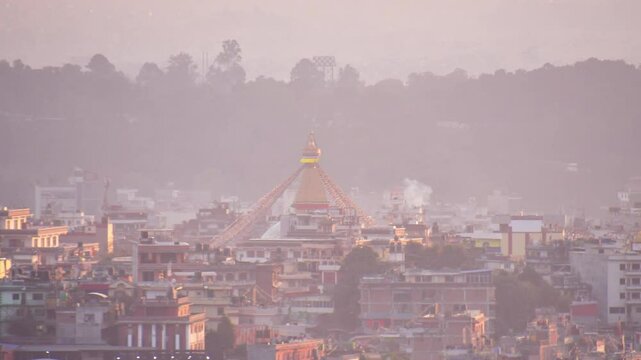 Aerial dynamic zoom 4k timelapse boudhanath stupa in nepal capital city kathmandu with traditional architecture buildings. Boudha Stupa - UNESCO's World Heritage Site. Golden hour Boudhanath panorama