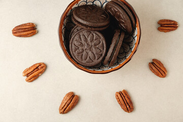Deliciously crafted chocolate cookies and pecans in an artistic arrangement