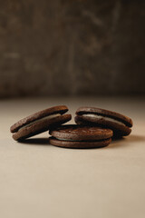 Delighting in rich chocolate cookies on a minimalist table