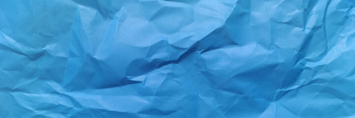 Obraz premium Panorama view Paper texture background, Crumpled paper. blue creased paper.