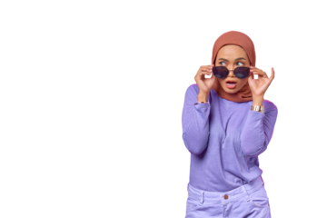 Portrait of shocked young Asian woman wearing glasses and looking aside isolated on transparent background