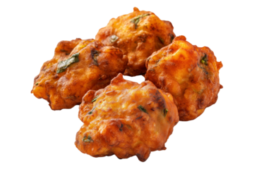 Crispy golden vegetable Indian fritters Pakoras with herbs, isolated on white transparent background, concept of traditional snack