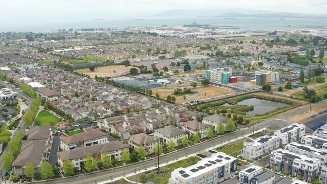 Aerial view of Alameda Oakland suburban urban homes, buildings, harbor 04