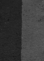 Abstract Black and Gray Textured Paper Wall Rough Concrete Surface with Split-Tone Pattern