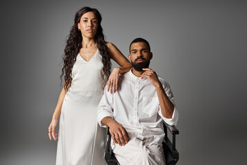 Stylish couple exudes romance and elegance in modern fashion setting