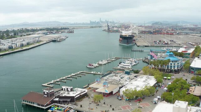 Aerial view of Alameda Oakland suburban urban homes, buildings, harbor 05