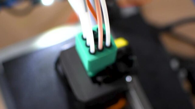 3d printer printing an object on the tray with pla filament, corn starch, non waterproof filament