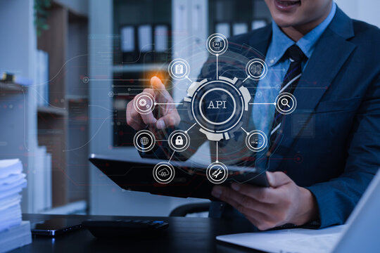 Modern technology and networking concept, woman using laptop, tablet and smartphone with virtual screen API icon Software development tool. API Application Programming Interface.