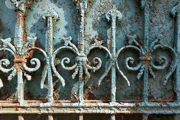 Ancient rusty forged fence decoration