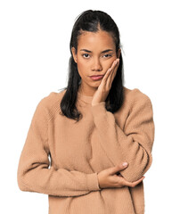 Young Filipina woman who is bored, fatigued and need a relax day.