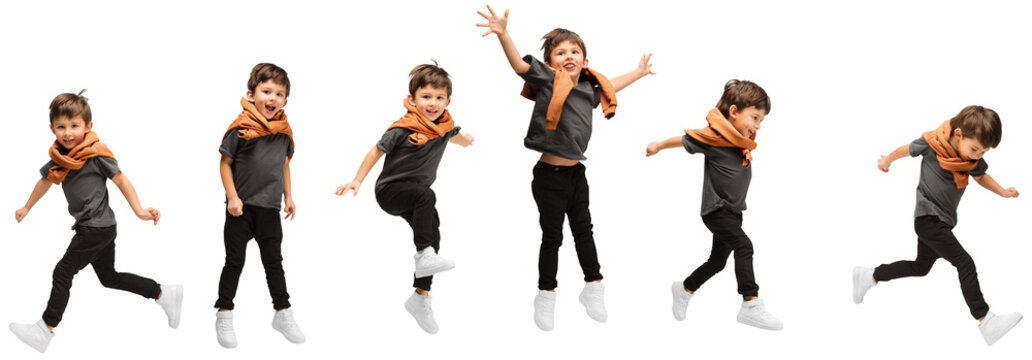 Looks delighted, joyful. Collage with images of little cute kid, happy boy jumping, running isolated on transparent background. Education, emotions, facial expression and childhood concept.
