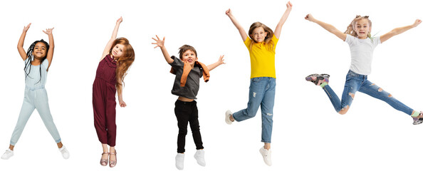 Five elementary school kids or pupils jumping in colorful casual clothes isolated on transparent background. Creative collage. Back to school, education, childhood concept. Cheerful girls and boy.