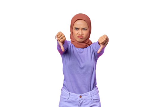 Angry young Asian woman showing rejection with thumbs down gesture isolated on transparent background