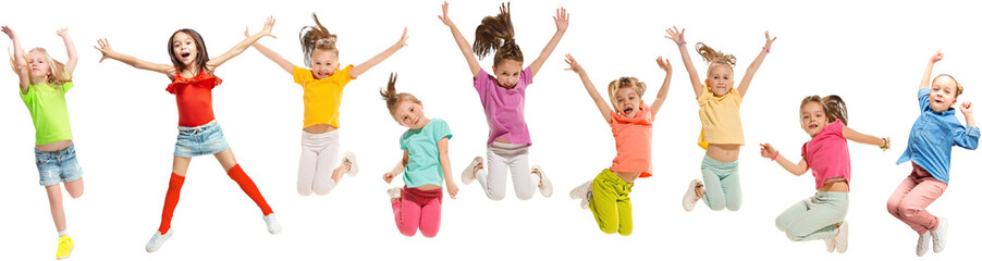 Group of children jump mid-air in colorful bright outfits,having fun and joy isolated on...