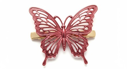 Fototapeta premium Close up of a pink butterfly hair clip with gold clip on a white background in a studio shot