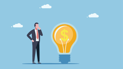 Businessman contemplates a dollar sign idea a large lightbulb symbolizes financial innovation