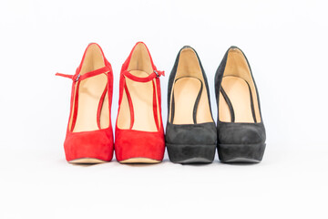 black and red pumps next to each other with a white background