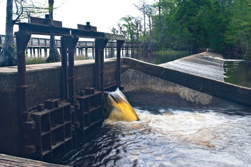 Water flowing from the dam and spillway of Lake Waccamaw.