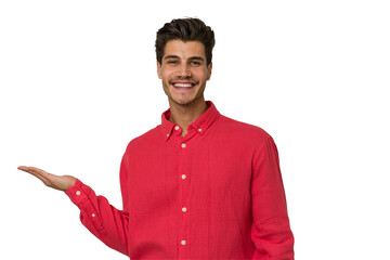 Young handsome caucasian man isolated on white background showing a copy space on a palm and...