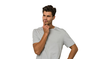 Fototapeta premium Young handsome caucasian man isolated on white background keeping a secret or asking for silence.
