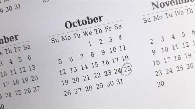 marking 25 October date on the calendar	
