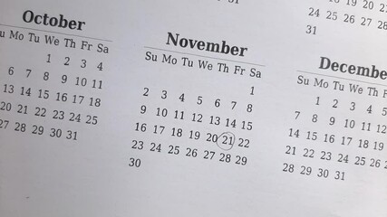 marking 21 November date on the calendar	
