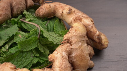 Ginger root vegetables and fresh mint leaves Concept health diet.
