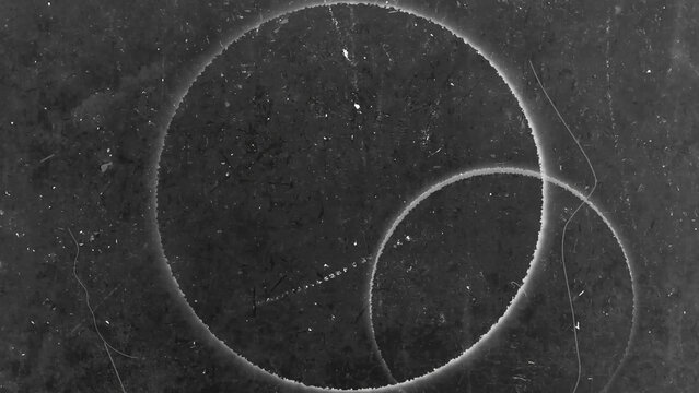 Punch hole retro 4k film transitions effect black background screen overlay grunge abstract.