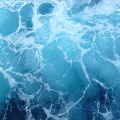 Vibrant turquoise ocean water with foamy white waves and swirling textures. Dynamic sea surface background ideal for nature themes, travel design, marine artwork, and creative projects.