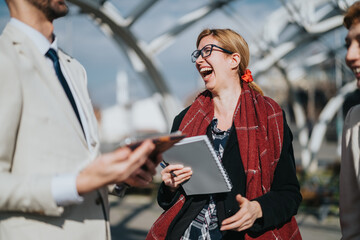Business colleagues sharing laughter and communication in an urban outdoor setting