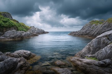 Obraz premium Rocky Cove Seascape Under Stormy Sky