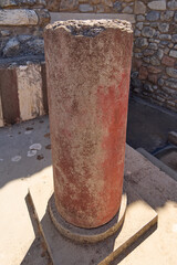 Red column of Knossos Palace in ancient ruins