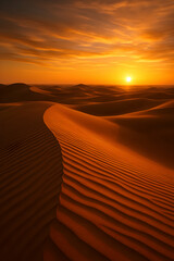 Desert sand dunes at sunset with golden light