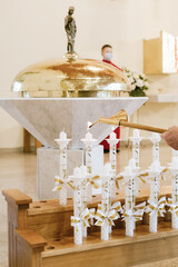 Communion Candles During First Holy Communion Mass Ceremony