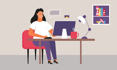 Woman sitting on a red chair in her apartment and working on a laptop at the desk