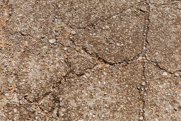 Cracked Concrete Floor Surface Showing Wear and Structural Damage