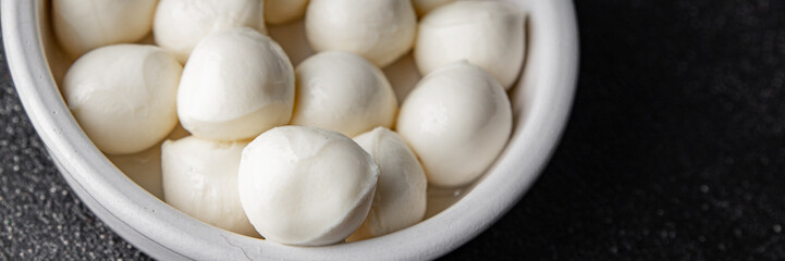 Mozzarella mini cheese balls dish fresh delicious gourmet food background on the table rustic food top view copy space