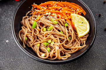 Buckwheat noodles soba in a bowl fresh dish Asian cuisine on the table rustic food top view copy space