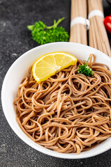 Buckwheat noodles soba in a bowl fresh dish Asian cuisine on the table rustic food top view copy space