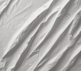 Fototapeta premium Deep creases and wrinkles texture a crumpled white poster , paper, abstract
