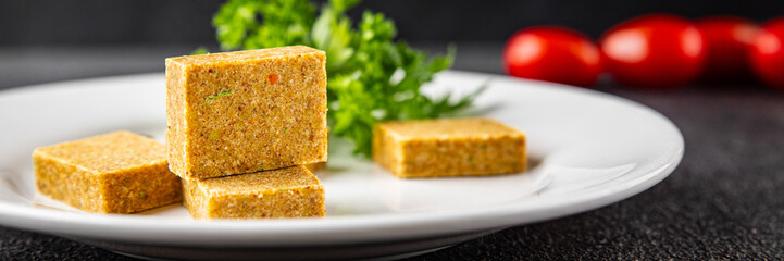 Broth cube vegetable, meat broth concentrated broth chicken, pork, beef meat natural food fresh dish on the table rustic food top view copy space