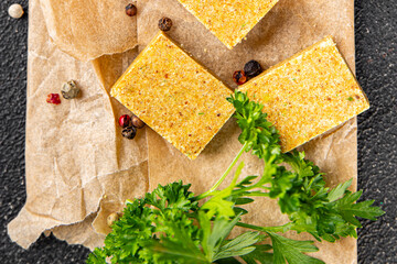 Broth cube vegetable, meat broth concentrated broth chicken, pork, beef meat natural food fresh dish on the table rustic food top view copy space