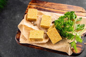 Broth cube vegetable, meat broth concentrated broth chicken, pork, beef meat natural food fresh dish on the table rustic food top view copy space