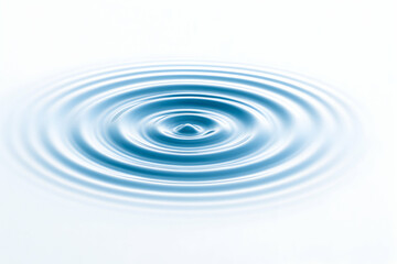 Ripples on tranquil water surface reflecting light.